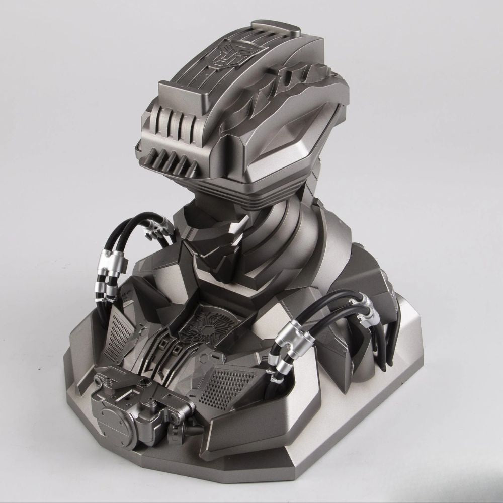Transformers helmet stand sculpted as a mechanical torso with an Autobot insignia